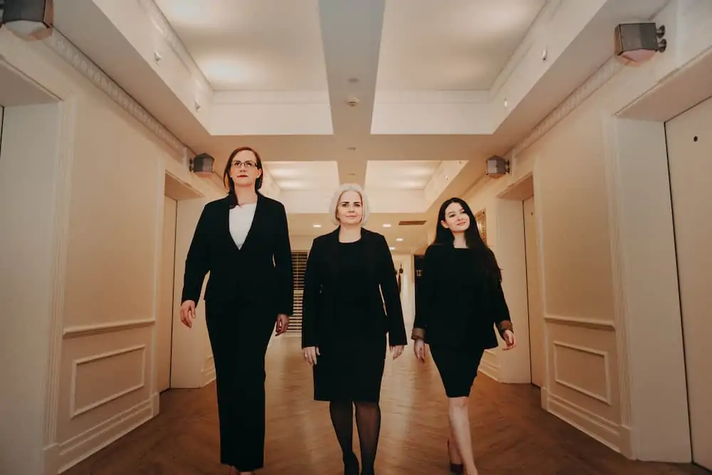 lawyers walking through a corridor