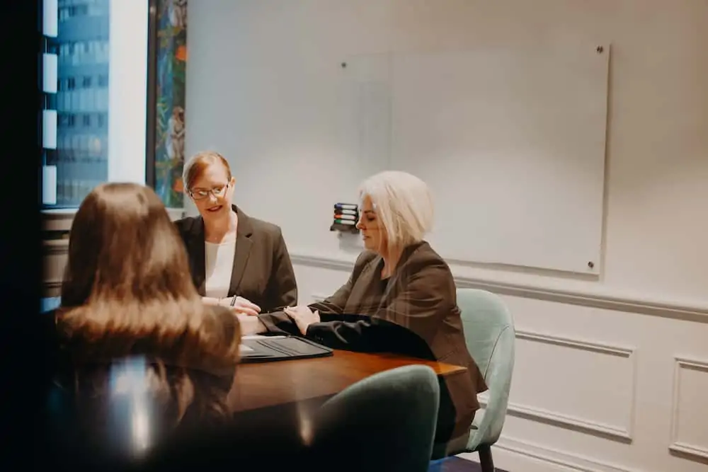 insurance lawyers having a meeting in a board room