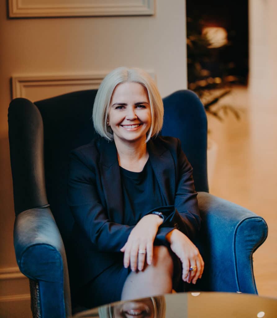 Kate Denning sitting in a chair