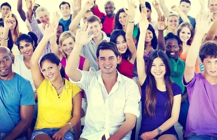 Volunteers raising their hands