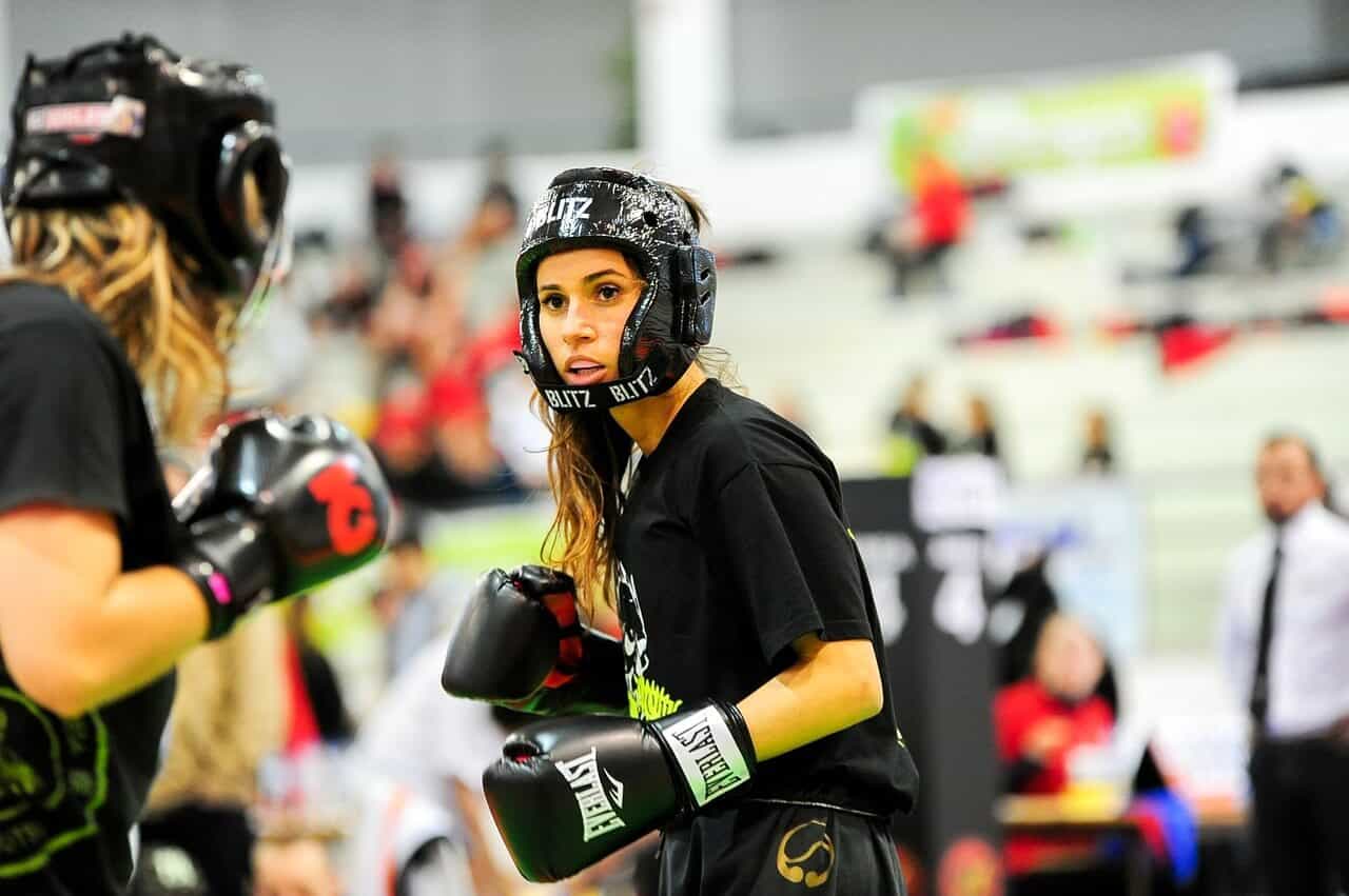 someone kick boxing and doing a dangerous recreational activity