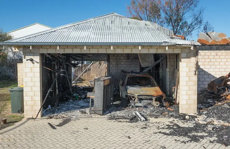 a damaged garage after a house fire